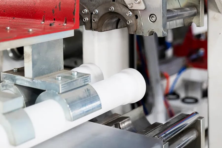 PVC socket supported by pipe belling machine tooling